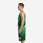 Side view of custom forest green basketball uniforms showing white shoulder panel insert, flat armhole binding, and matching lightning pattern shorts