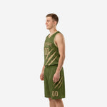 Side view of custom forest green basketball uniform showing claw-mark graphic continuing from jersey across the shorts outer leg
