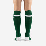 Green soccer socks with white toe cap detail, full-dye sublimation polyester construction, close view