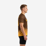 Custom full print training jersey side view showing Athletic Gold gradient hem and botanical leaf sleeve print in Chocolate Brown