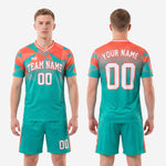 Full custom teal and coral soccer kit set from K2 Sportswear with sublimated geometric design