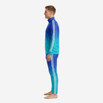 Custom gradient soccer tracksuit in Royal Blue to Turquoise with tapered pants and stand collar full-zip jacket, side profile