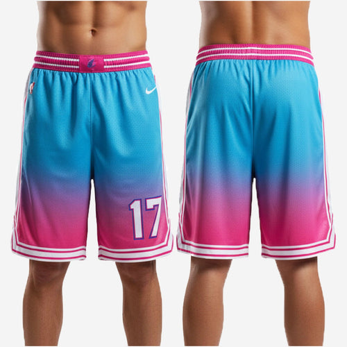 Detail of sublimated gradient fade on custom teal basketball shorts showing teal to purple to pink color transition