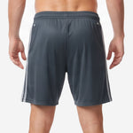 Detail view of the elastic waistband and white drawcord on custom graphite gray soccer shorts