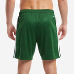 Close-up of elastic waistband on custom green and white soccer shorts showing clean finished edge and double-stitch seam