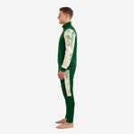 Custom green and white soccer tracksuit right side view showing Forest Green stand collar full-zip jacket and tapered pant leg with Off-White panel