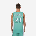 Opposite side view of the kelly green basketball jersey with white side panel and sleeveless athletic cut for full range of motion