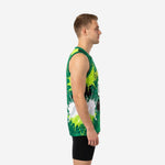 Front view of custom green basketball jersey showing V-neck, arced team name in yellow lettering, and large white front number on kelly green splash background