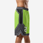 Custom green basketball shorts showing charcoal Y-shaped side panel geometry and contrast hem band, side view on male model