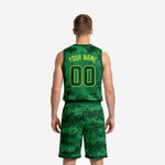Back view of custom green basketball uniform set showing digital camo print and neon lime back number on jersey