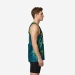 Men's teal and gold custom basketball jersey with full-panel peacock feather sublimation print and gold armhole binding, front view