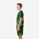 Custom green soccer uniform right side view with player name and number on back, Forest Green and Athletic Gold
