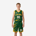 Custom green and gold youth basketball uniforms with diagonal gold slash pattern, V-neck binding, and matching shorts - front view