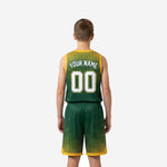 Opposite side view of custom green and gold youth basketball uniform showing wide armhole binding and shorts side vent