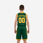 Side panel detail of green and gold youth basketball uniform showing bold diagonal gold stripes on jersey and shorts with gold chevron hem accent