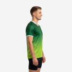 Mens green soccer training jersey showing full gradient sublimation print from left side profile