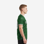 Left side view of a men custom soccer jersey in Forest Green showing white and silver sleeve cuff trim and silver side panel