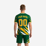 Custom green soccer jersey detail showing Athletic Gold stars, slash-burst diagonal graphic, and V-neck Gold and White trim