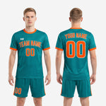 Custom green soccer kit teal and orange close-up detail of crew neck collar and cuff band