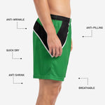 Custom green soccer shorts straight hem detail at leg opening with reinforced double stitching on 100 percent polyester fabric