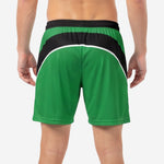 Custom green soccer shorts elastic waistband close-up showing black waistband with internal drawcord and Kelly Green panel transition