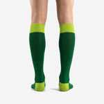 Close-up of Lime Green ribbed cuff band on custom Forest Green soccer socks for club teams
