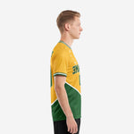 Custom green soccer team jersey showing side profile with Athletic Gold upper panel and Kelly Green lower panel, short sleeve detail