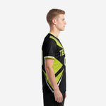 Custom green soccer team jersey left side view showing Lime Green geometric panels and White trim sleeve cuff