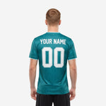 Close detail of tonal geometric floral sublimated underlay pattern on Teal custom green soccer team jersey