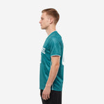 Right side view of custom green soccer team jersey in Teal with white sleeve cuff contrast and straight hem