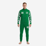 Custom green soccer tracksuit with white digital camo sleeves and tapered pants, front view on adult male model