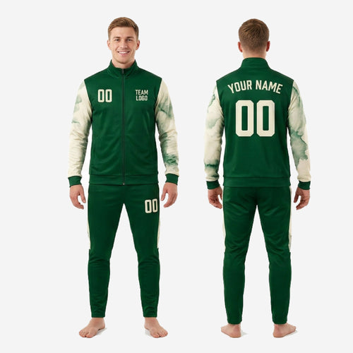 Custom green and white soccer tracksuit pants side panel detail showing Off-White marble-splash stripe and ribbed ankle cuff on tapered leg
