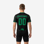 Black and kelly green soccer training jersey close-up of botanical leaf outline sublimation print across short sleeve panel