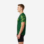 Custom green soccer training jersey back-side view displaying back surname and number print in Neon Green on Forest Green body