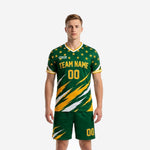 Custom green soccer uniforms in Forest Green and Athletic Gold with star and slash-burst print, front view on adult male model