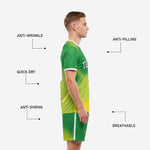 Custom green soccer uniforms Kelly Green matching shorts with yellow gradient fade and player number on leg