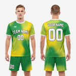 Custom green soccer uniforms Kelly Green and Yellow 2-piece sublimated jersey and shorts flat lay kit view