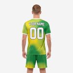 Custom green soccer uniforms Kelly Green and Yellow full-dye sublimated kit back view showing player surname and number