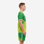 Custom green soccer uniforms Kelly Green and Yellow gradient side view showing short sleeve construction and shorts white side stripe