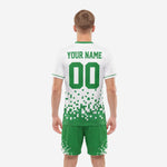 Custom sublimated Kelly Green and White soccer jersey detail showing pixel scatter print and crew neck with green contrast trim