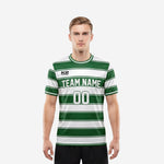 Custom green and white horizontal stripe soccer jersey front view with team name and number printed on chest, worn by male model