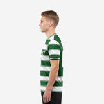 Custom green soccer jersey team left side view showing full horizontal stripe sublimation pattern and short sleeve cut