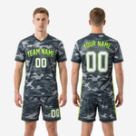 Custom grey camo soccer shorts with neon green side stripe and sublimated player number on left leg