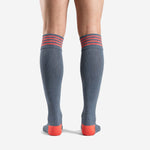 Close-up of coral hooped stripe detail on custom grey soccer socks ribbed cuff band