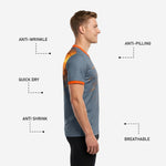 Close-up detail of full-dye sublimated spark-burst print on grey and orange custom soccer training jersey shoulder zone