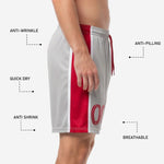 Sublimated player number in crimson red on grey soccer shorts lower leg panel