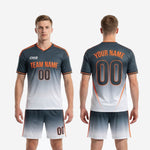 Complete custom grey soccer uniform set with Charcoal and Orange design available in youth and adult sizes YS through 3XL