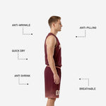 Back view of maroon custom high school basketball uniform showing back number placement and sunburst sublimation pattern
