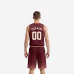 Right side view of maroon and blush custom basketball uniform set with diamond lattice shorts pattern