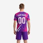 Custom hot pink soccer jersey chest detail with V-neck collar trim and sublimated geometric print